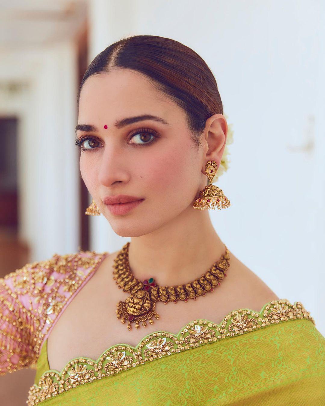 Tamannaah's choice and styling demonstrated her innate ability to seamlessly merge tradition with modernity, creating a look that resonated with elegance and sophistication.
